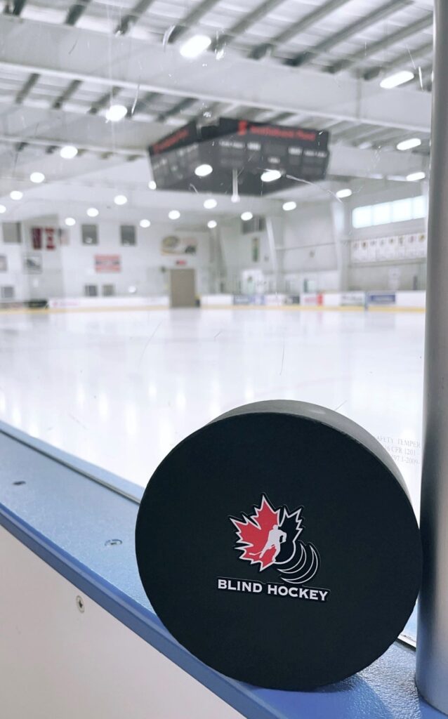 Canadian blind hockey puck with our logo on it