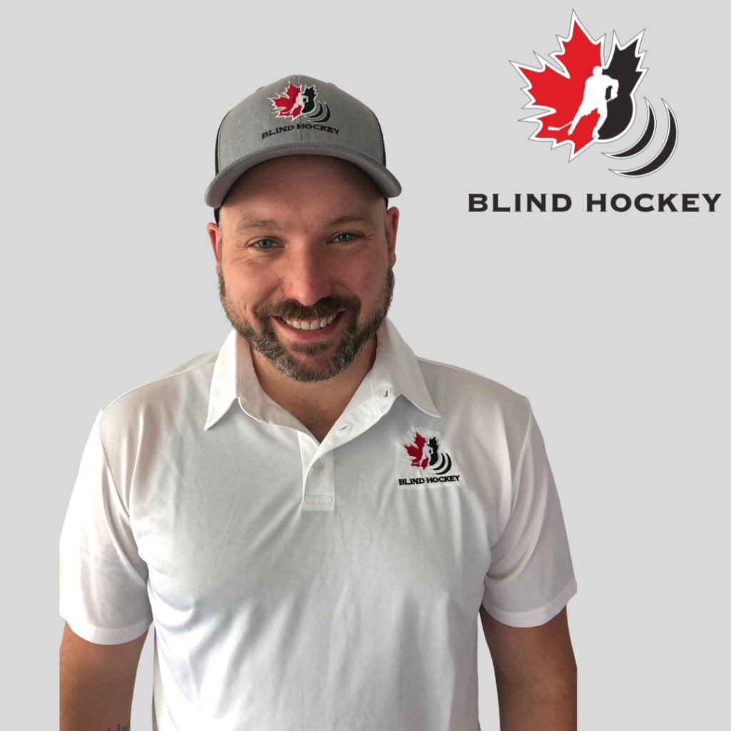Matt shaw is wearing a canadian blind hockey white golf shirt and hat